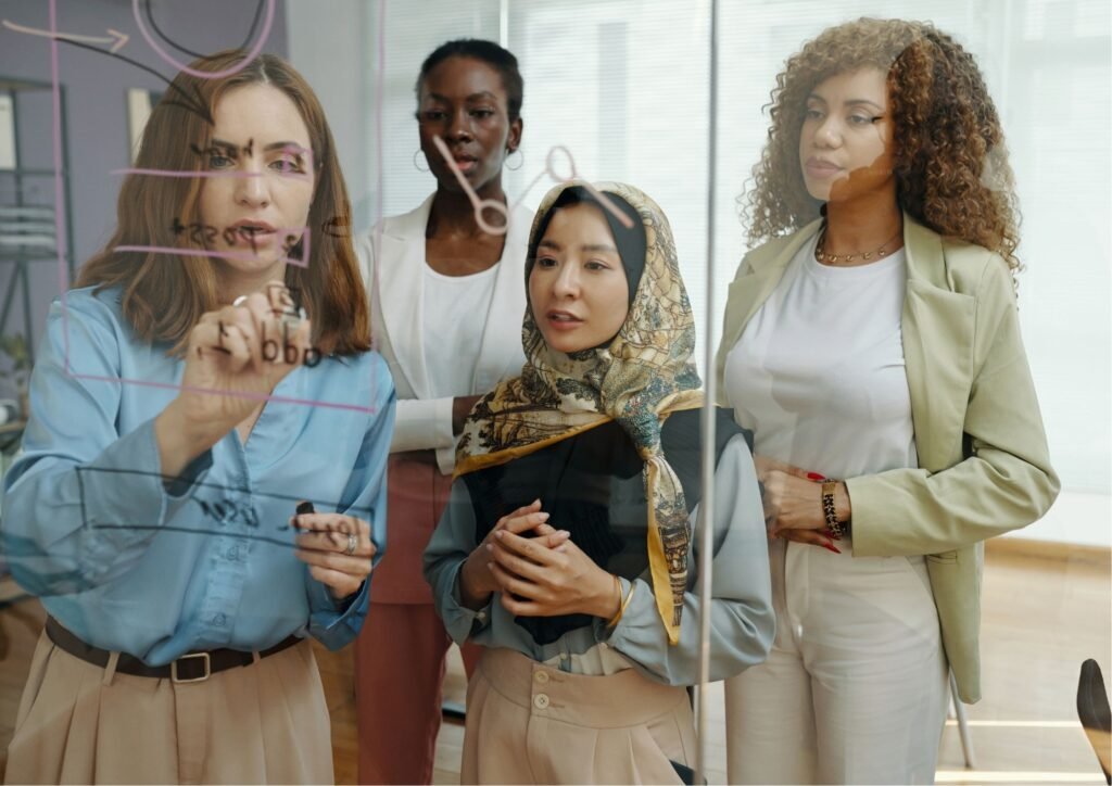 Women entrepreneurs participating in a business and visibility workshop in the UK