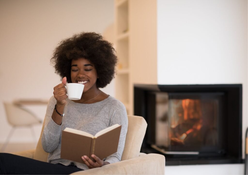 Black woman reflecting and journaling about her priorities